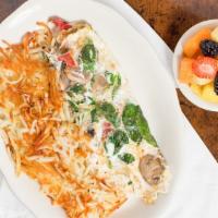 Iron Man Egg White Delight · Fresh spinach, mushrooms, red peppers, and low-fat mozzarella.