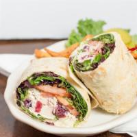 Chicken Salad Wrap · Our gourmet chicken salad mixed greens, tomato, and Swiss cheese.