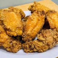 Fried Chicken Wings · Our home style fried chicken wings. 
Deep fried goodness that is marinated with traditional ...