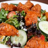 Buffalo Chicken Salad · Dinner salad topped with grilled or crispy chicken tossed with your choice of original ancho...