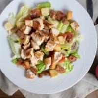 Pecan Chicken Salad · Mixed greens with tomatoes, blue cheese crumbles, glazed pecans, croutons and crispy or gril...