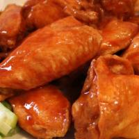 Traditional Wings (Single) · 10 bone in wings served with ranch.
