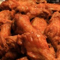 Traditional Wings (Platter) · 50 bone in wings served with ranch.