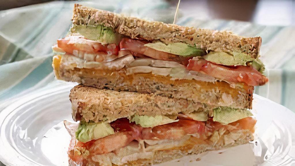 Tuna Avocado Melt Sandwich · Tuna salad with avocado, tomato, and melted mozzarella on your choice of bread.