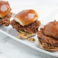 Spicy Fried Chicken Sliders · Jalapeños buttermilk marinated chicken  double coated with spicy seasoned flour. Served on a...