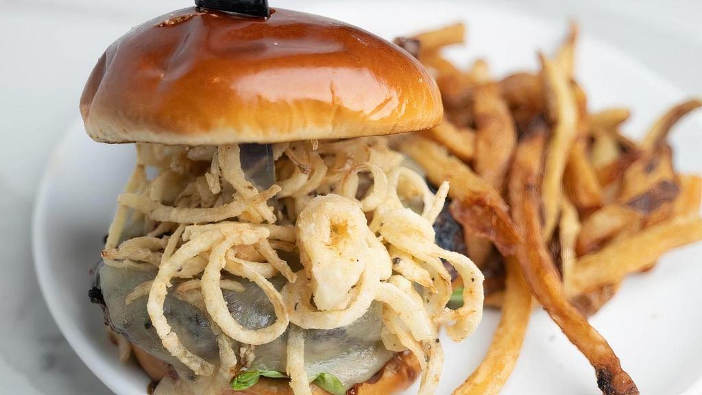 Bbq White Cheddar Burger · 1/2 lb. USDA choice lean ground beef patty prepared on a grilled pub bun spread with garlic aioli. Served with melted white cheddar cheese,. Black Butte BBQ sauce, crispy fried onion strings on red leaf lettuce and sliced tomatoes.