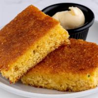Jalapeno Cornbread & Honey Butter. · Sweet cornbread baked with fresh jalapeños and yellow corn. Served warm with our sweet honey...