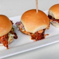 Bbq Pulled Pork Sandies · Smoked beer BBQ pork topped with Sriracha mayo and  Southern Slaw on a toasted brioche bun. ...