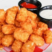 Crispy Tater Tots. · Served with peppercorn ranch or Sriracha dipping sauce.