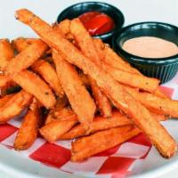 Sweet Potato Fries · Sweet Potato Fries are served with peppercorn ranch or Sriracha dipping sauces.