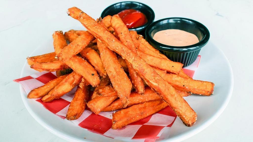 Sweet Potato Fries. · Sweet Potato Fries are served with peppercorn ranch or Sriracha dipping sauces.