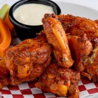9 Bone-In Killer Wings · BONE-IN WINGS. Served with carrots sticks, celery sticks, bleu cheese or ranch dressing. MAN...
