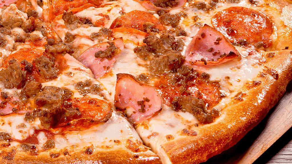 4 Meat “Carnes” · Meat, Meat, & more Meat! This Meaty Pizza starts with our four-cheese blend that includes 100% real mozzarella cheese, then we layer it with zesty pepperoni, Italian sausage, savory ham, and ground beef, all on our daily made fresh dough!
