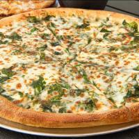Spinach Clásico · A Patrón favorite! Our fresh made dough is smothered with our delicious creamy alfredo sauce...