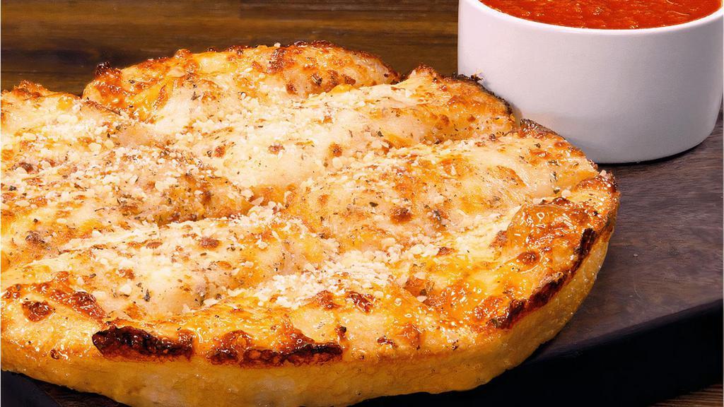Fresh Quesostix · Garlic Butter & Cheese? Yes Please! Our freshly made dough smothered with tasty garlic butter & topped with a heap of cheddar & mozzarella cheeses. It’s baked to cheesy perfection, then finished with Parmesan & Romano cheeses & a side of robust marinara.