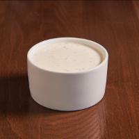 Fresh Ranch · Our Ranch is made daily from scratch with Belgian buttermilk and a zesty blend of herbs and ...