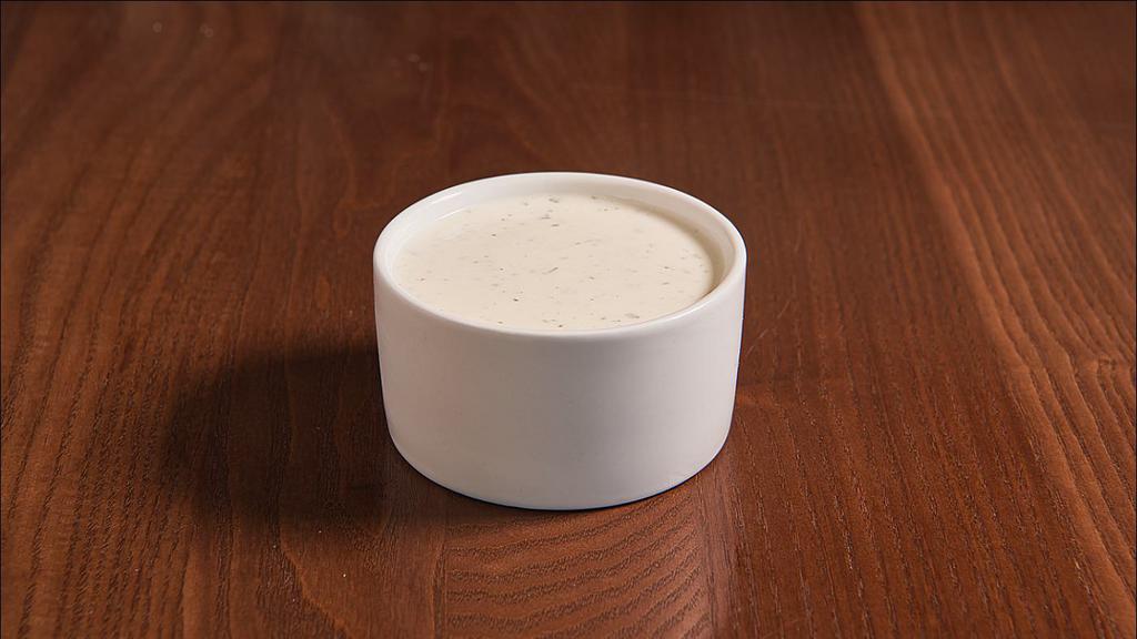 Fresh Ranch · Our Ranch is made daily from scratch with Belgian buttermilk and a zesty blend of herbs and spices.