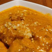 Korma · Assorted nuts soaked and creamed, mild spices and a hint of saffron