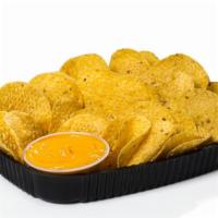 Chips & Queso · Tasty tortilla chips and creamy homemade queso dip.