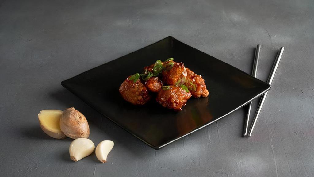 Boneless Korean Wings · Boneless chicken wings tossed in a classic Korean BBQ sauce.