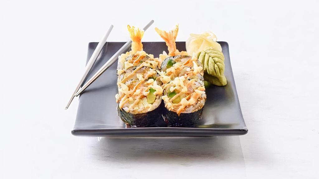 Tempura Shrimp Roll · Shrimp tempura, avocado, cucumber and sushi rice wrapped in nori. Topped with spicy mayo, Japanese BBQ, and tempura crunch.