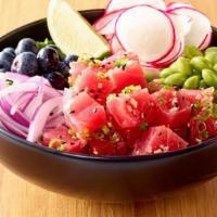 Aloha Poke Bowl · A bed of sushi rice filled with marinated tuna, green leaf lettuce, blueberry, edamame, red ...