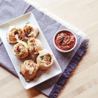 Rome'S Roni Rolls · When pizza gets a makeover….and it’s delicious! Hand-stretched pizza dough rolled and oozing...