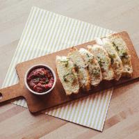 Mozzarella Garlic Bread · Probably better get two orders, it’s that good…Toasted French baguette slices covered in moz...