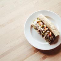 Italian Chicago Cheesesteak · There’s regular cheesesteak…and then there’s Chicago. cheesesteak, our version takes the spi...