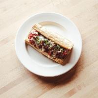 Homestyle Meatball Sandwich · Don’t wear your white shirt! Toasted French roll with our homemade meatballs, topped with ma...