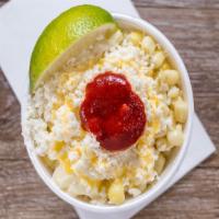Elote · Authentic Mexican white corn or yellow corn; topped with lime, mayo , butter, chile, and fre...