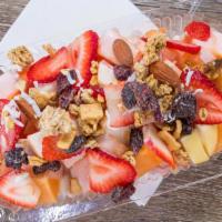 Bionico · Mexican fruit salad with strawberries, cantaloupe, apples, papaya, and banana drizzled with ...