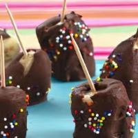 Chocobanana · Frozen banana popsicle dipped with gourmet chocolate, Sprinkled with your choice of rainbow ...