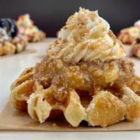 Apple Pie Waffle · Our delicious Belgian Pearl Sugar waffle, dusted with powdered sugar, topped with apple pie,...