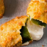 Jalapeno Poppers · Mild jalapeño pepper halves stuffed with rich cream cheese coated in a light, crispy breading.