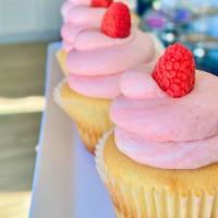 Vanilla Raspberry Cupcake  · vanilla cake with raspberry mousse.