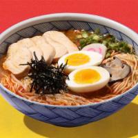 Spicy Shoyu Chicken Ramen · Spicy soy broth with noodles and chicken.