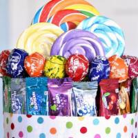 2 Tier Filled Mjk Kandy Cakes · This is a candy cake that is filled and surrounded by great quality candy or chocolate bars.