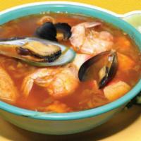 Caldo De Mariscos · Fish fillet, shrimp, octopus, squid, clams, black clam, potatoes, and carrots. Bread or flou...