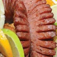 Parrillada De Camarones · Served with rice, refried beans, salad, onion and bell pepper.  Bread or flour tortillas (3)...