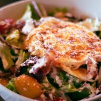 Cobb Salad · Hearts of Romaine, Cherry Tomatoes, Bacon, Fried Egg, Red Onions, 
Gorgonzola with a House R...