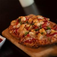 Grilled Chicken · Smoked Gouda, House Marinara, Mozzarella, Parmesan-Romano Cheese, Red Onions 
and Roasted Re...