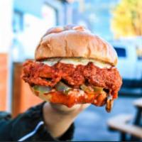 Spicy Project · Signature Breaded Chikn Covered in Our Spicy Garlic Buffalo Sauce, House Ranch, and Served w...
