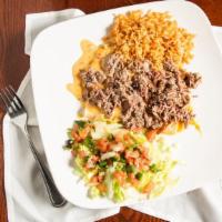 Build Your Own Enchilada · Three cheese enchiladas topped with choice of queso, enchilada or sour cream sauce, served w...