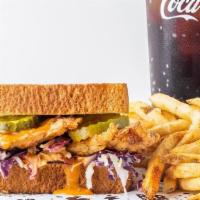 Spicy Rooster Sandwich Combo · Our signature Spicy Rooster Sandwich served with seasoned fries and choice of drink.