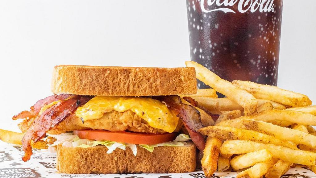 Texas Fried Chicken Club Sandwich Combo · Our signature Texas Fried Chicken Club served with seasoned fries and choice of drink