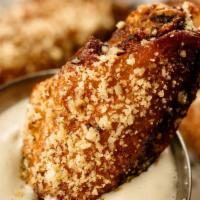 Wings 10 · 12-hour Shiner Bock brined chicken wings. These birds are brined and brewed with attitude!