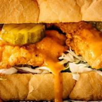 Spicy Rooster Sandwich · Two Texas sized tenders, housemade jalapeño coleslaw, jumbo sweet pickles, drizzled with our...