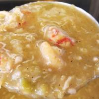 Gumbo · Our gumbo come with chicken, sausage, shrimp, and crawfish over rice.
