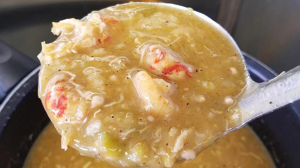 Gumbo · Our gumbo come with chicken, sausage, shrimp, and crawfish over rice.